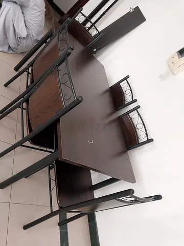 Brand new dining table with chairs available