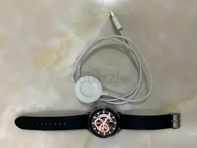 Huawei Watch (silver and black band) with wireless charger - good condition