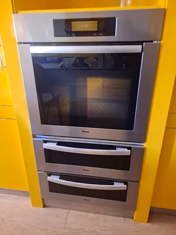 Miele Built-in stainless steel electric oven 75cm with warming drawers