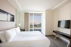 Modern sophistication with urban views in fully furnished 1 Bedroom Apartment
