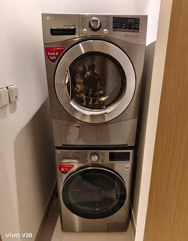 LG 9kg Stacked front-load washer and dryer set - good condition Latest Version