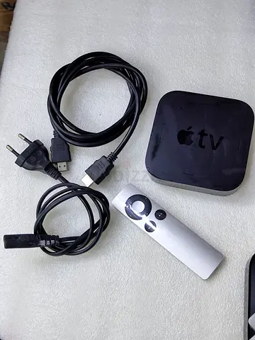 Apple TV (3rd/ gen) streaming box with remote and cables