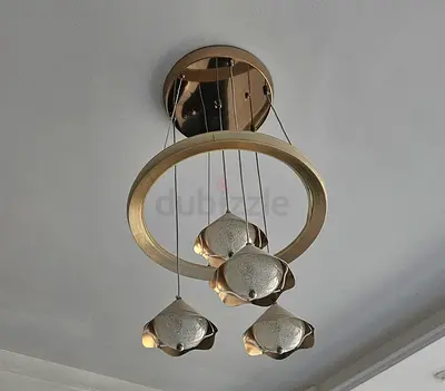 Modern gold ring chandelier with 4 hanging globes - good condition