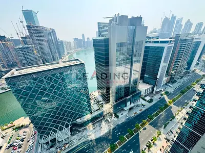 High-Floor Office | Canal & Skyline Views