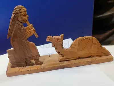 Wooden man with camel figurine set-22cm length