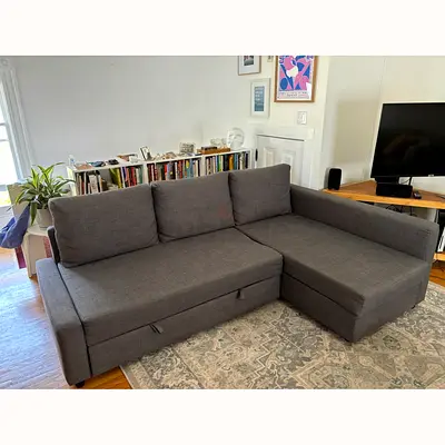 Modern Grey L-Shaped Sofa with Pull-Out Bed