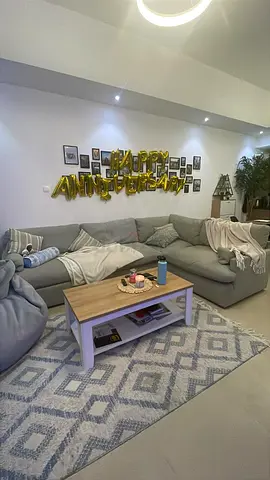 Light Grey L-shape Modular Sofa with Ottoman in Excellent condition.