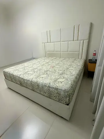 Modern Upholstered Bed with Paneled Headboard