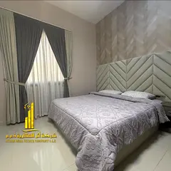 Luxury one-bedroom apartment with open views in Ajman - Corniche - next to Bahi Hotel - furnished, a