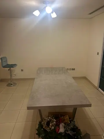 Modern rectangular dining table with concrete-look top (good condition)