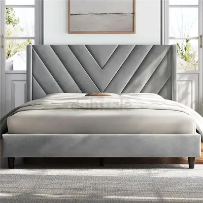 Beige upholstered queen bed with padded headboard