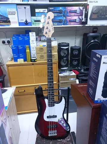 4-String Electric Bass Guitar -Good Condition with cable