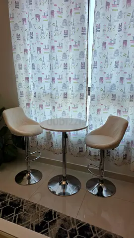 White Bar Table with Two Matching Swivel Stools