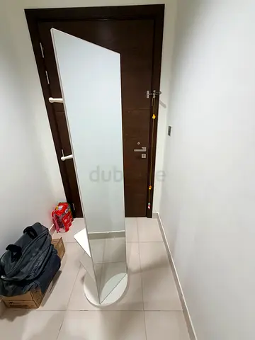Rotating full body mirror