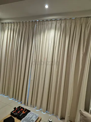 Cream / beige blackout curtains with rails. 2 sets.