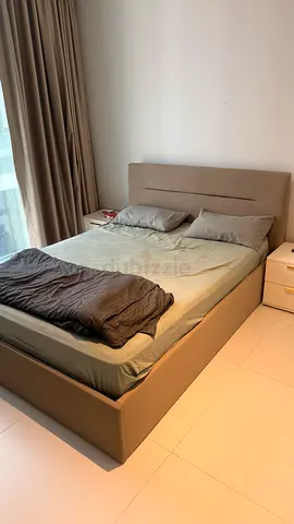 Grey upholstered bed frame with mattress and side tables - very good condition