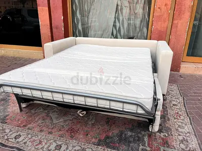 Perfect condition three Seater Sofa bed Beige color