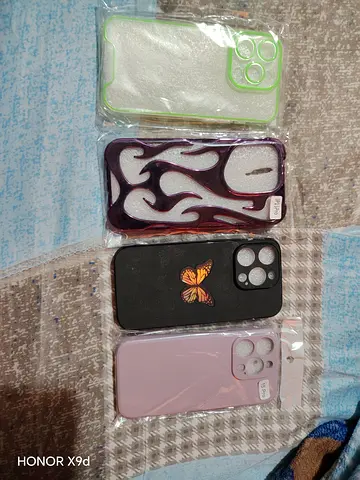 Set of 4 mixed iPhone 15 Pro -style protective cases (various colors/designs)