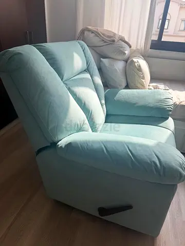 Light blue recliner armchair - good condition