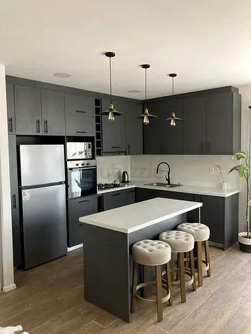 Modern grey fitted kitchen with island and storage cabinet - excellent condition
