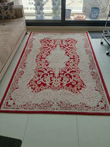 Red and cream patterned rug - good condition, 160x230cm (approx)