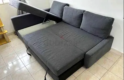 Grey L-Shaped Sofa Bed with Integrated Storage