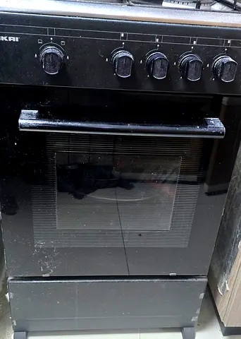 Used black freestanding gas cooker with oven - good working condition