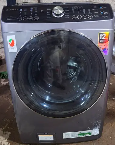 Daewoo full dryer 12 kg washing machine. Free delivery