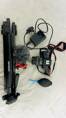Canon M50 Mark 2 with tripod, mic, charger and accessories - fresh & good condition. Rarely used.