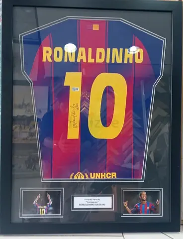 Ronaldinho Signed Barcelona Jersey with Beckett authentication