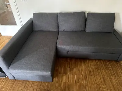 Grey L-shaped sofa with chaise lounge - good condition