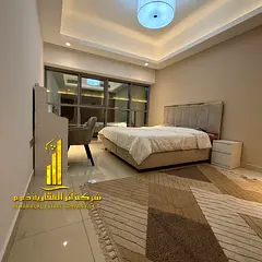 Luxury two-bedroom apartment with a living room and open view in Ajman - Al Rashidiya 1 - Gulf Tower