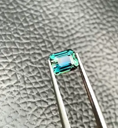 Loose emerald-cut teal/blue gemstone (emerald cut)