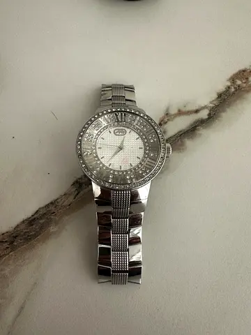 Silver-ton unisex watch with crystal-studded bezel - excellent condition
