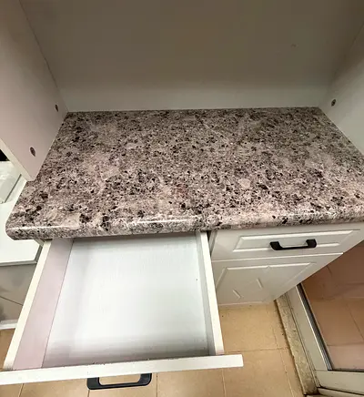 White Kitchen Cabinet with Granite-Style Countertop - Good Condition