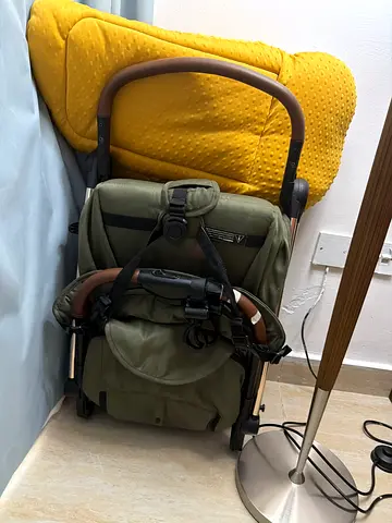 Compact olive green baby stroller / pram - good condition