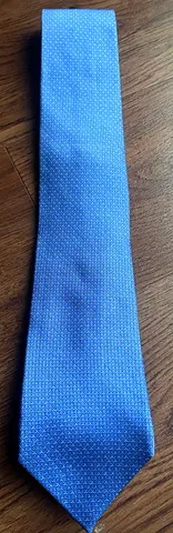 Light blue men's silk tie with subtle pattern - used once - Michael Kors