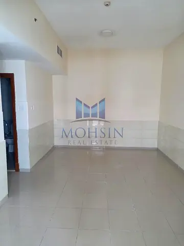 Distress Deal Hot Offer" 2 BHK Apartment Garden & City View For Rent With Parking At Prime Location of Ajman Pearl Towers.
