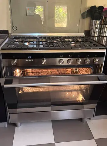 Siemens Freestanding IQ700 Top Gass With Electric Oven Cooking Range