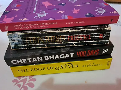 Bundle: 4 Mixed Fiction Paperbacks — Alice in Wonderland, The Edge of Never, 400 Days, Colinton