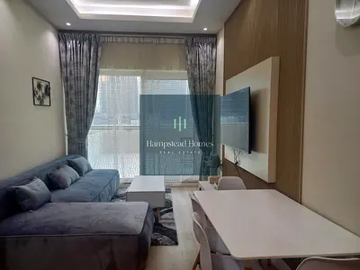 Canal-Front 1BR | Huge Terrace | Burj Views