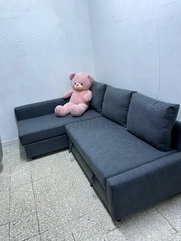 Grey L-shaped Sofa Bed with Storage - Good Condition