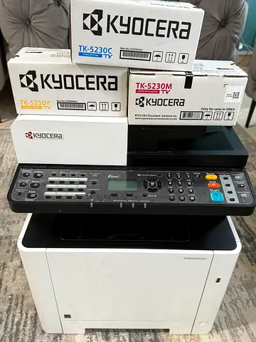 Printer Model: Appears to be the Kyocera ECOSYS M5521cdw, a compact wireless color all-in-one laser