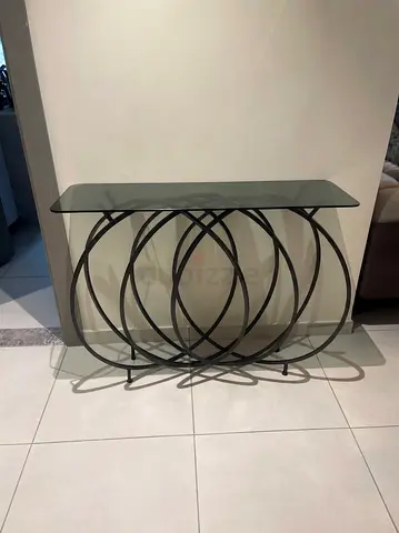 Glass Top Console Table with Decorative Circular Metal Base