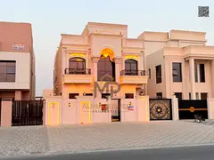 A luxurious classic villa in Al-Haliyo 2 on a main street, with a 15-meter front setback providing p