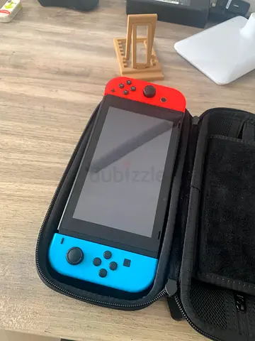 Nintendo Switch (Neon Red/Blue) with Carry Case - Good Condition