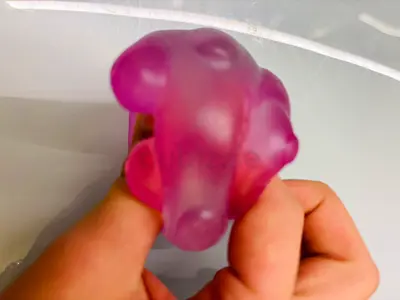 Small purple squishy stress toy / sensory fidget