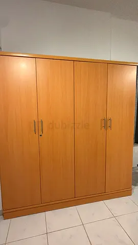 4-door wooden wardrobe in good condition