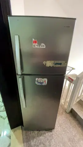 Used double-door refrigerator - Silver,stainless steel, good working condition