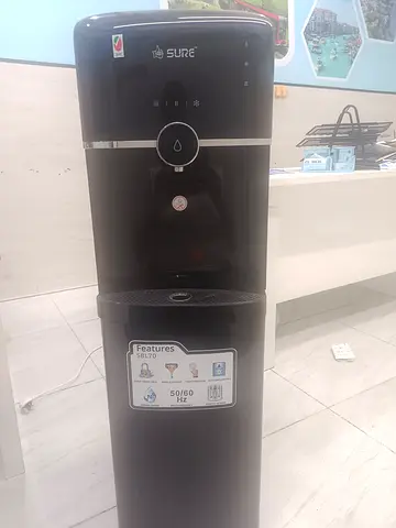 Black Sure Water Dispenser - Floor Standing Cooler/Heater In Good condition